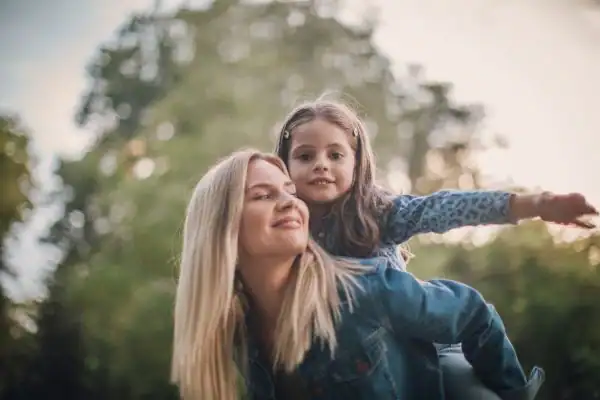 happy mum and daughter following mediation to resolve parental alienation Basildon